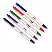 Plunger action ballpoint pen with colored clip and tip.